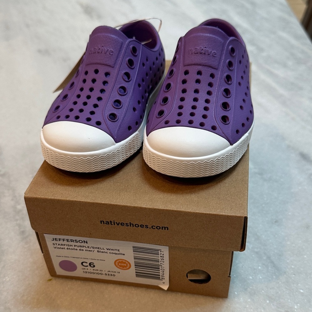 Brand New- size 6. Never worn purple natives.